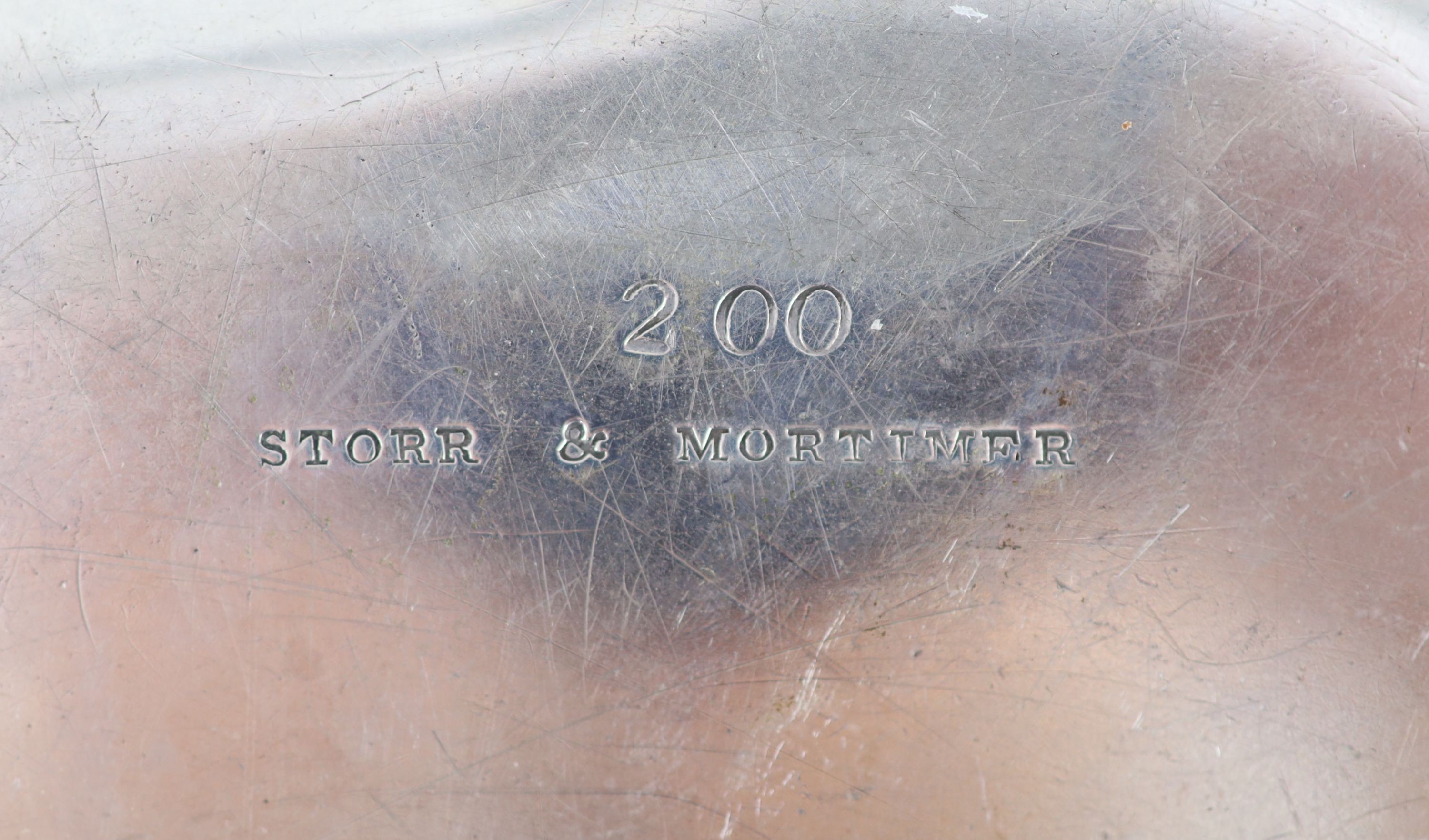 A pair of late George IV silver shaped circular dinner plates by Paul Storr